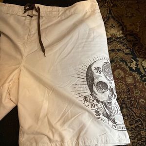 Cargo shorts. Off white/khaki w/black skull